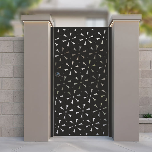 Black metal laser cut pedestrian garden gate featuring modern stylized daisy floral and starburst pattern