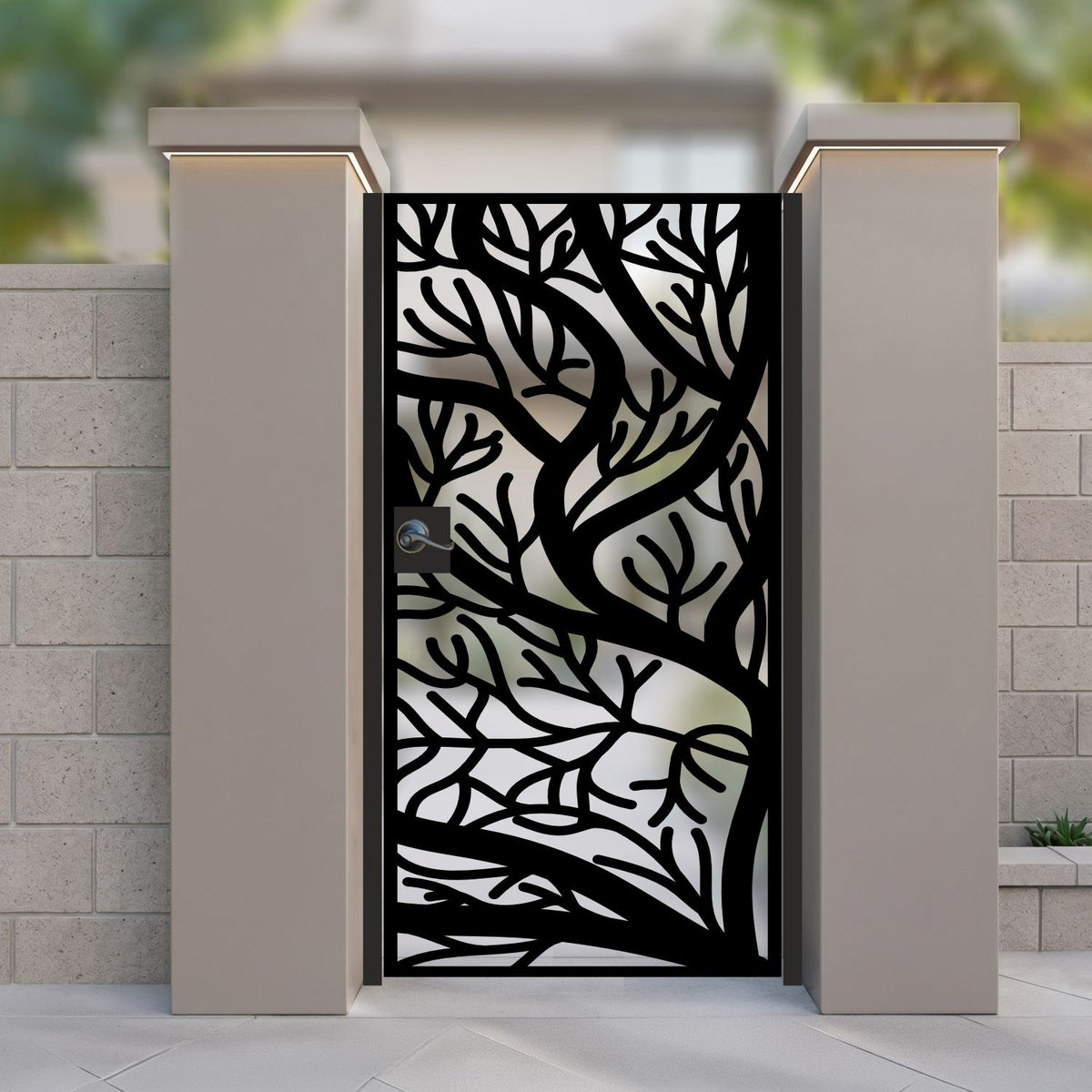 Modern black laser cut metal garden gate with deep sea coral tree branch pattern installed between stucco pillars