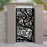 Modern black laser cut metal garden gate with deep sea coral tree branch pattern installed between stucco pillars