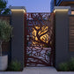 Nature inspired laser cut steel gate panel detail with powder coated red black finish