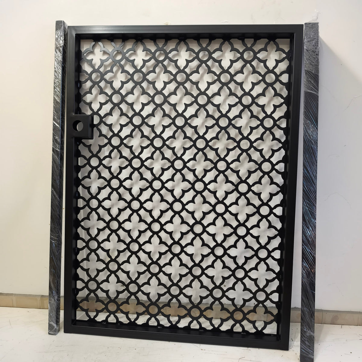 Back of the Casablanca Moroccan metal garden gate showing the welded steel profile frame behind the laser cut panel