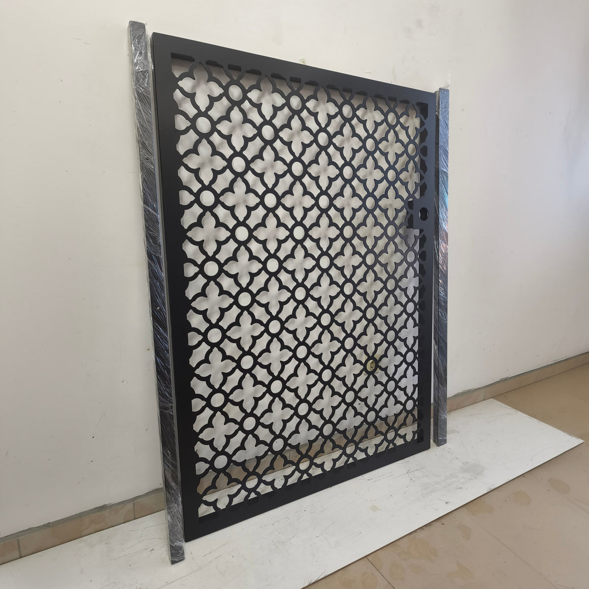 Side angle view of the Casablanca Moroccan black steel pedestrian gate with integrated lock box and included corner posts