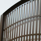 Laser cut metal entry garden gate with arched top frame featuring central daisy flower garden pattern