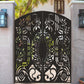 Black powder coated laser cut metal double pedestrian gate featuring arched top frame with ornate floral damask pattern installed between concrete pillars
