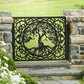 Black powder coated laser cut metal pedestrian garden gate featuring central circular tree of life pattern installed between natural stone pillars