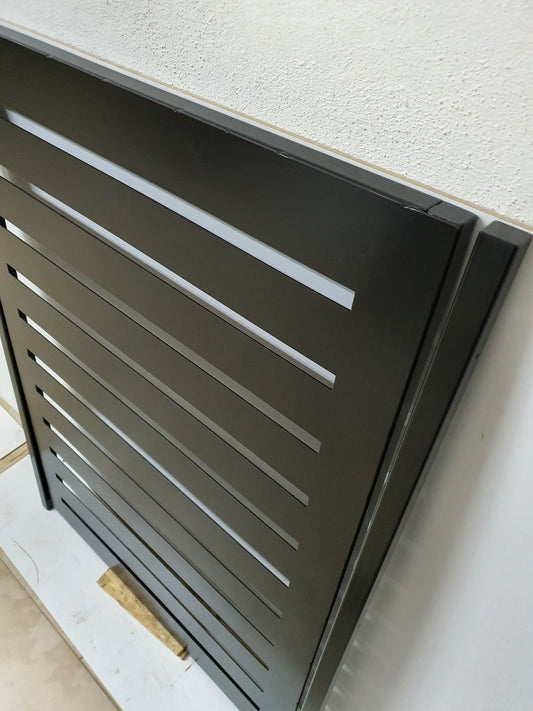 Metal privacy garden gate featuring modern horizontal slat cutouts with side mounting posts