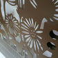 Metal laser cut pedestrian garden gate with arched top frame featuring central daisy flower garden pattern