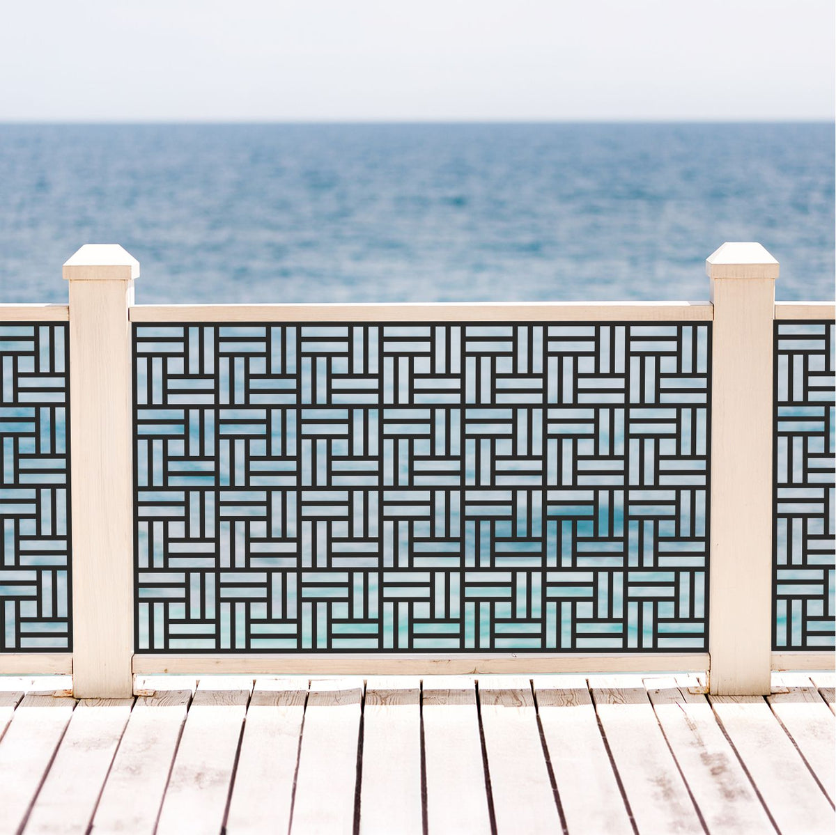 Black decorative laser cut metal deck railing insert panel with modern basketweave geometric pattern