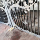Metal laser cut double driveway gate featuring tree of life pattern with maple leaves