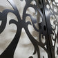 Black powder coated laser cut metal double pedestrian gate and lock box detail