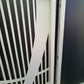 White powder coated laser cut metal pedestrian garden entrance detail