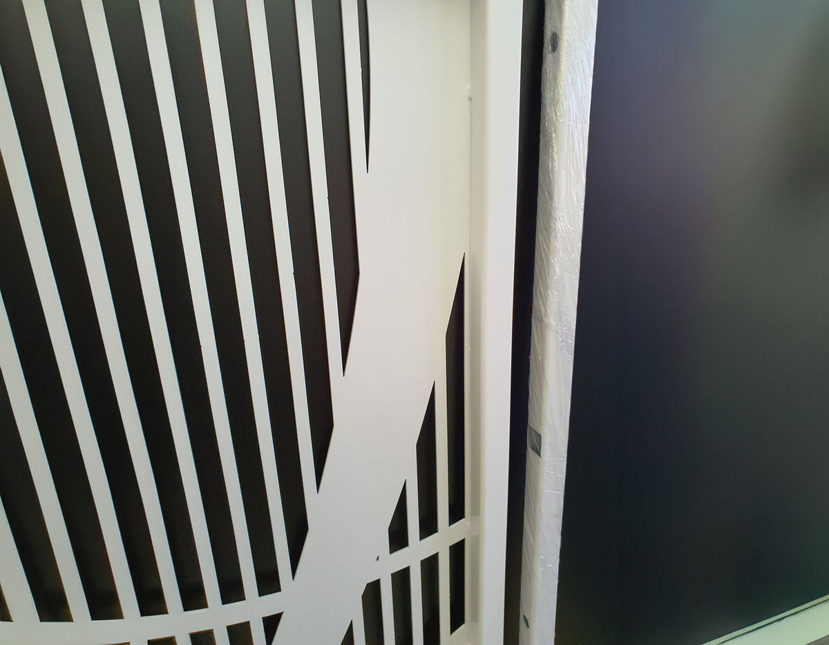 White powder coated laser cut metal pedestrian garden entrance detail
