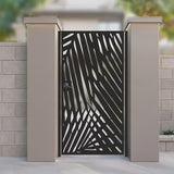 Black metal laser cut pedestrian garden gate featuring modern abstract palm leaf pattern