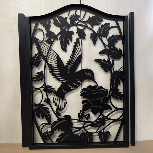 Matte black metal laser cut pedestrian garden gate featuring curved top frame with hummingbird and botanical floral vine pattern