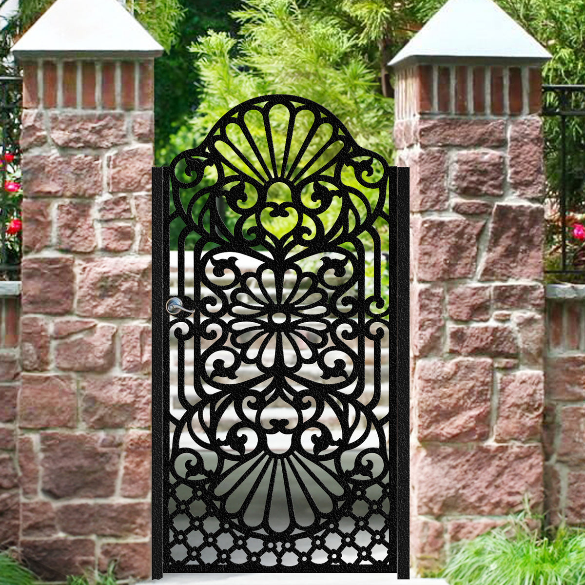 Black metal laser cut pedestrian garden gate featuring central floral rosette and fan scrollwork pattern