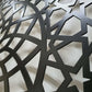 Matte black powder coated laser cut metal pedestrian garden gate featuring arched top frame