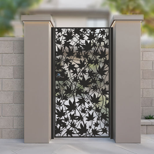 Black metal laser cut pedestrian garden gate featuring full coverage Japanese maple leaf and branch network pattern