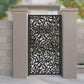 Black metal laser cut pedestrian garden gate featuring full coverage tropical lily flower and leaf mosaic pattern