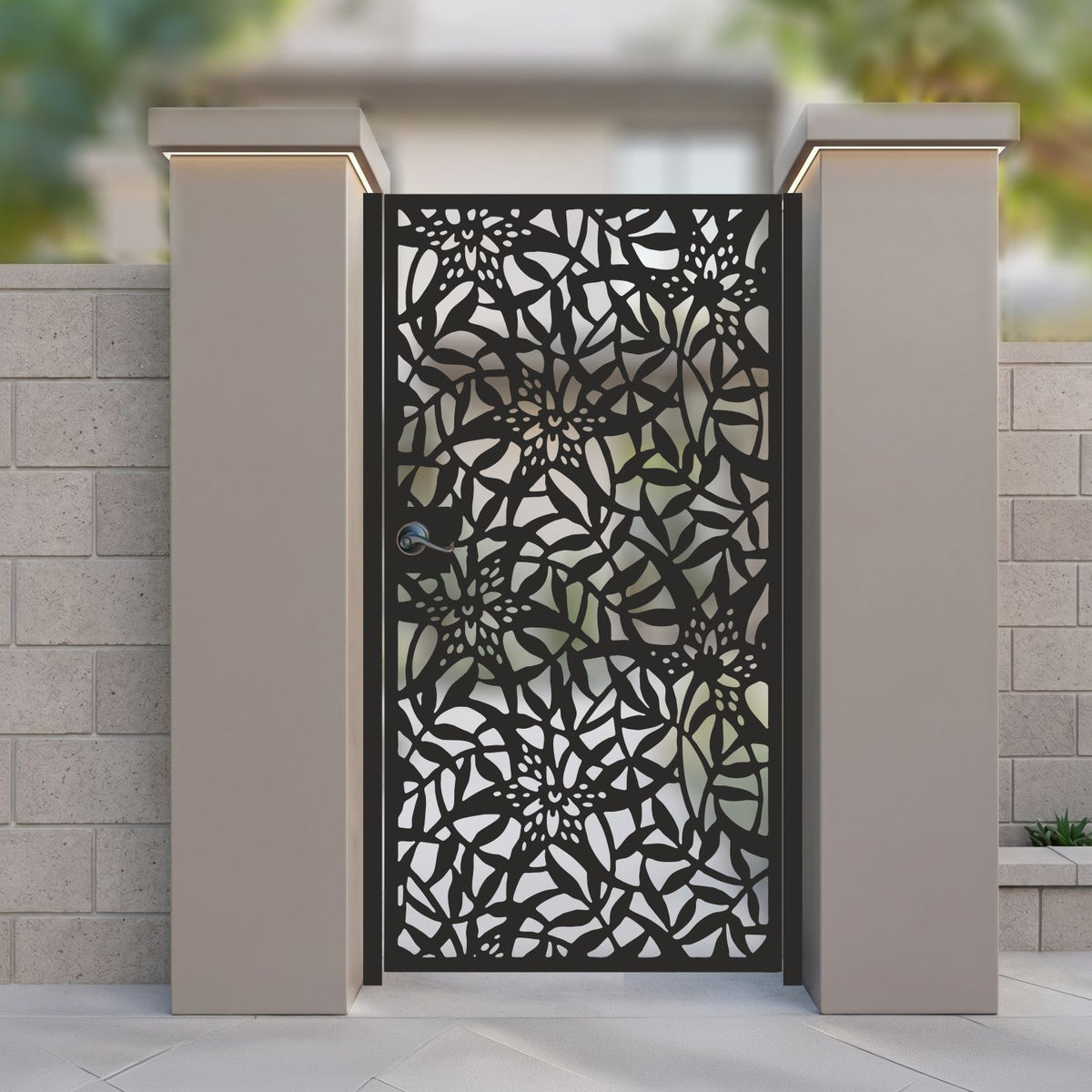 Black metal laser cut pedestrian garden gate featuring full coverage tropical lily flower and leaf mosaic pattern