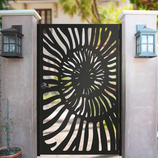 Black metal laser cut pedestrian garden gate with organic nautilus ammonite shell spiral pattern