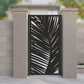 Black metal laser cut pedestrian garden gate featuring modern tropical palm frond leaf silhouette design