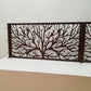 Dark brown metal laser cut fence railing panel featuring organic tree branch and coral silhouette pattern