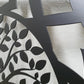 laser cut metal pedestrian garden gate featuring central circular tree of life pattern