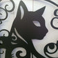Metal garden gate cat design detail