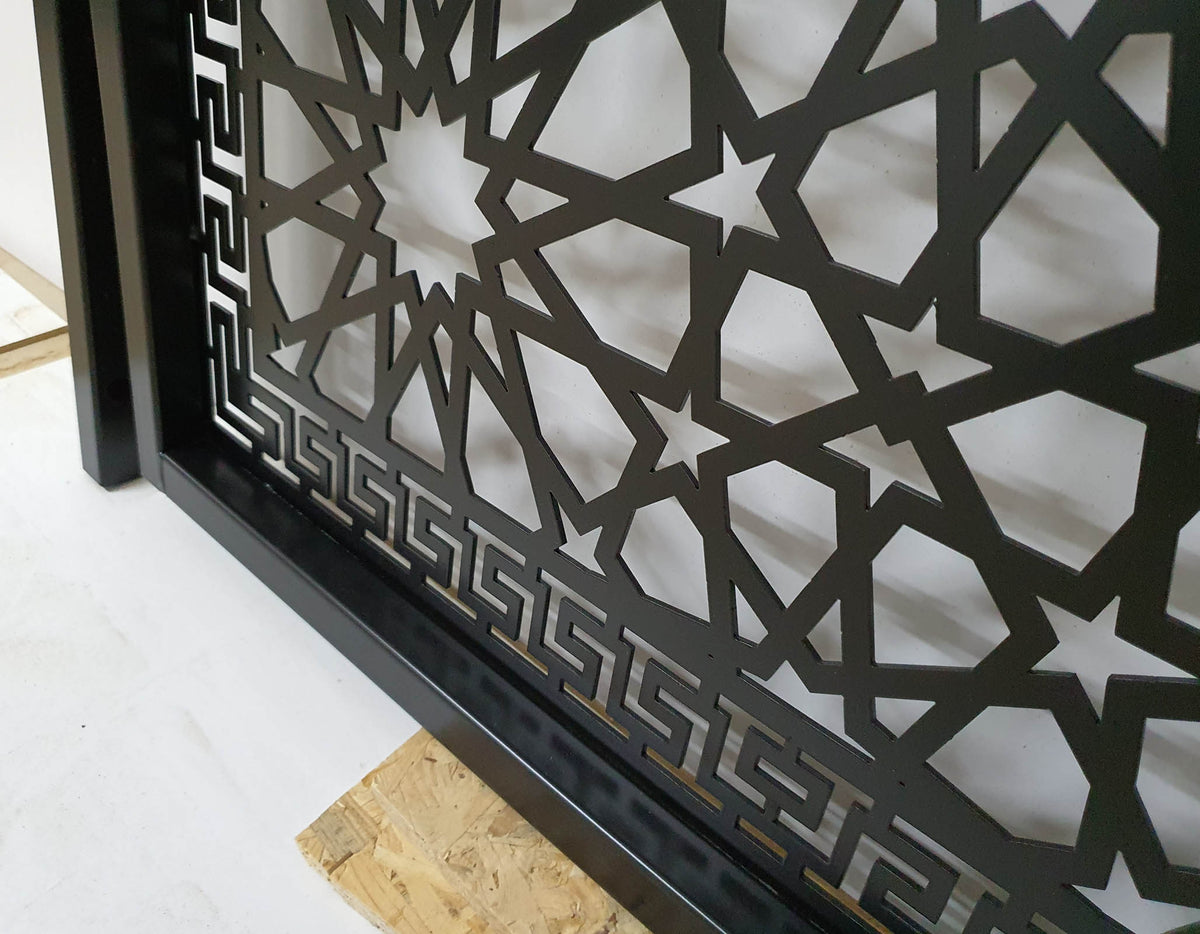 Laser cut metal pedestrian garden gate featuring arched top frame with Islamic geometric star pattern and Greek key border