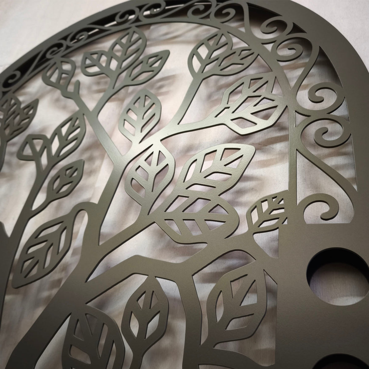 laser cut metal indoor gate featuring tree of life design with roots and leaves