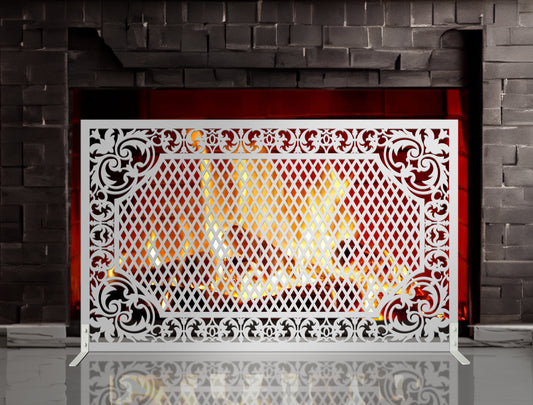 White powder coated laser cut metal freestanding fireplace screen featuring central diamond mesh pattern with ornate scrollwork frame and support feet