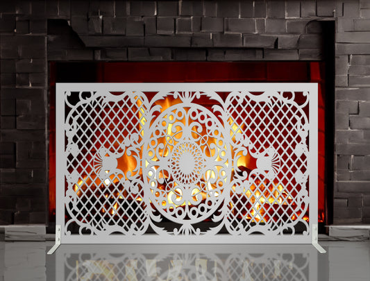 White powder coated laser cut metal freestanding fireplace screen featuring central oval mandala medallion and lattice grid pattern with support feet