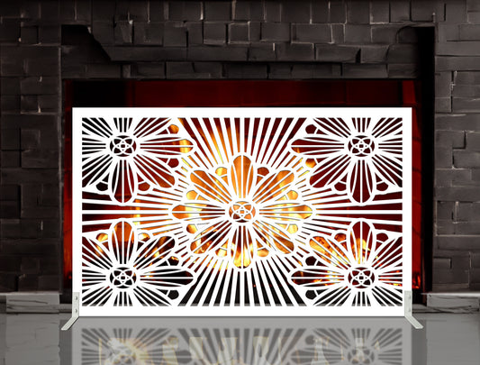 White powder coated laser cut metal freestanding fireplace screen featuring sunburst floral flower pattern with support feet