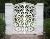 White powder coated laser cut metal pedestrian garden gate featuring arched top frame with Islamic geometric star pattern and Greek key border