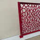 Honeycomb Voronoi laser cut balcony railing panel mounted on a square steel post with surface mount base plate