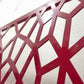 Close-up of the honeycomb Voronoi laser cut cell pattern with smooth glossy powder coated edges