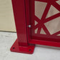 Surface mount base plate of a steel post holding a red honeycomb Voronoi laser cut metal fence panel